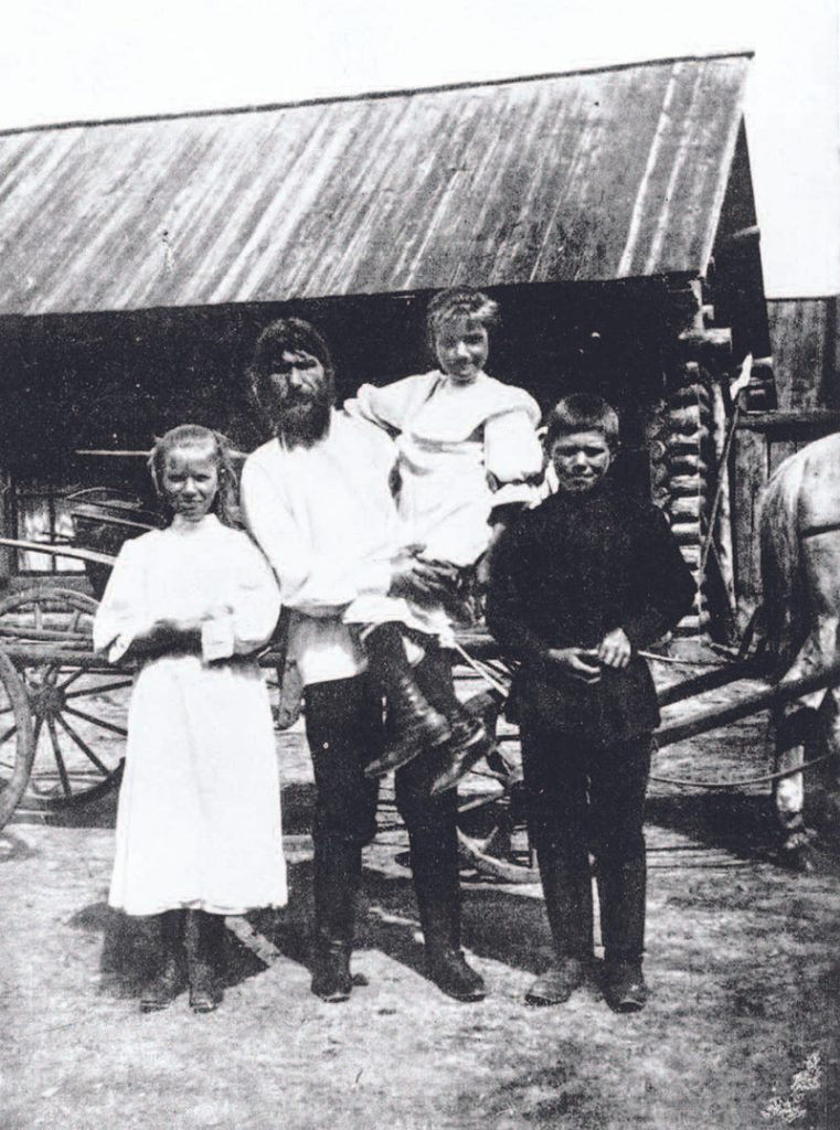 Rasputin and his children (Varvara, Maria, and Dimitri)
